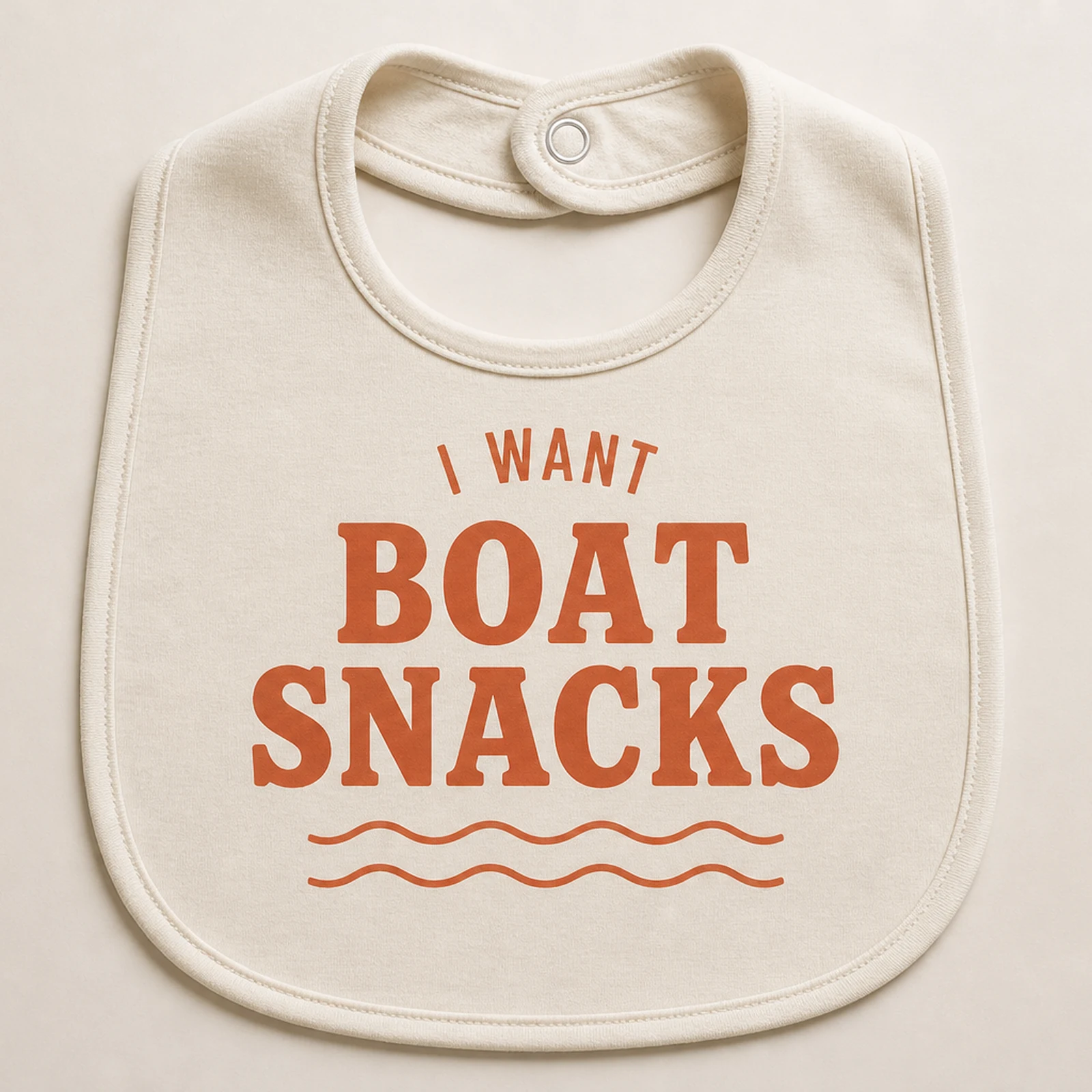 Boat Snacks bib in oyster and coral